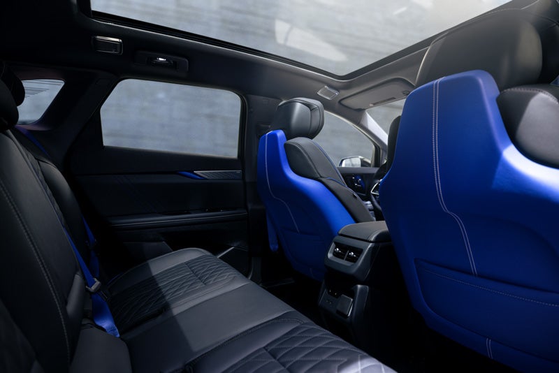 Back Seat View of the 2026 OPTIQ-V Blue Front Seats, Sun Roof, and Interior | Denny Menholt Cadillac in Rapid City SD